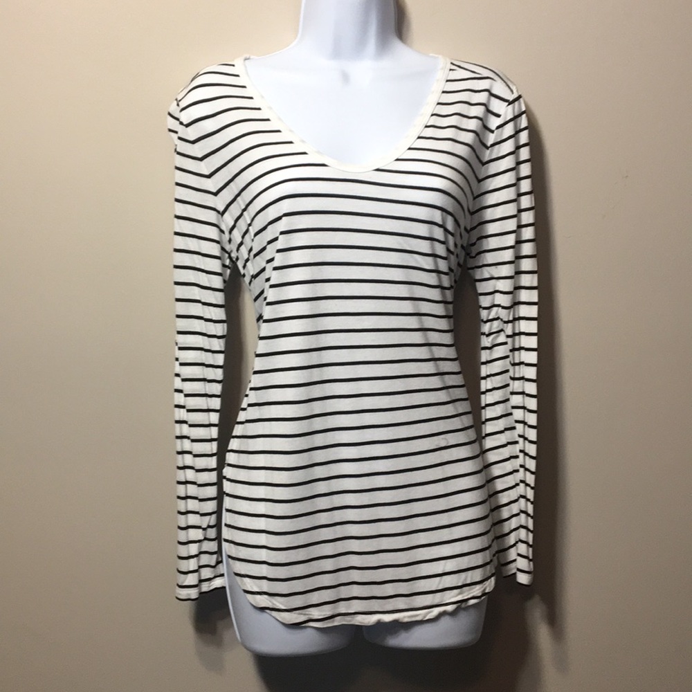 New. Never worn. Black and white striped top.